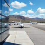 découvrez une collection de photos aériennes et terrestres de l'aéroport de figari sud corse, mettant en valeur son infrastructure moderne et son cadre pittoresque en corse du sud.